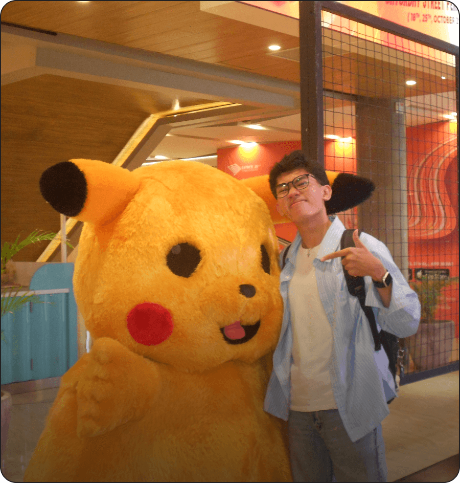 Andre with a Pikachu mascot